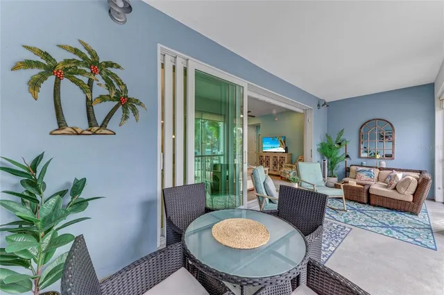 a view of a patio with wooden floor