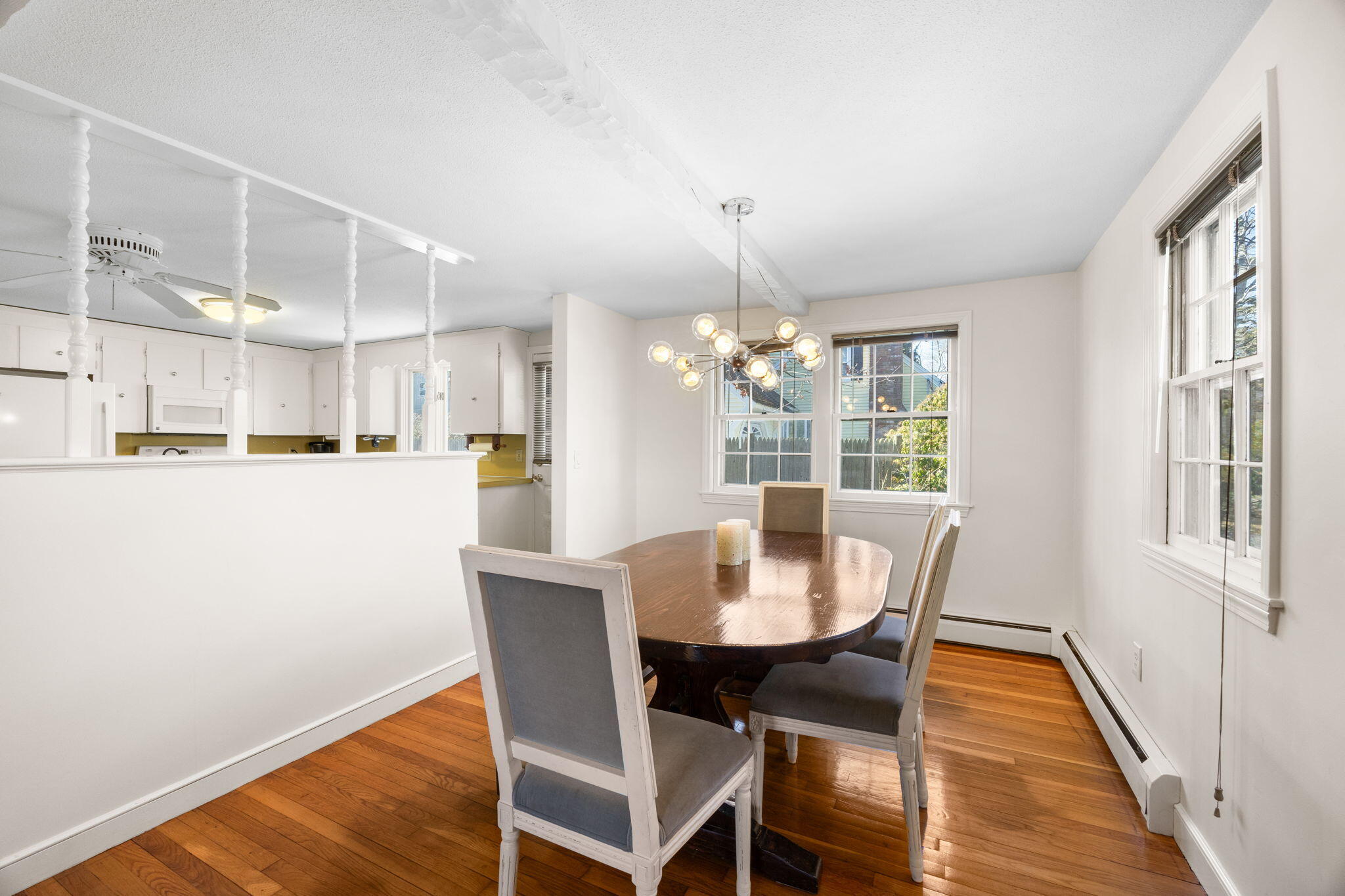 105 Annable Point Road Centerville, MA 02632 - Photo 6 of 27 a view of a dining room with furniture wooden floor and chandelier