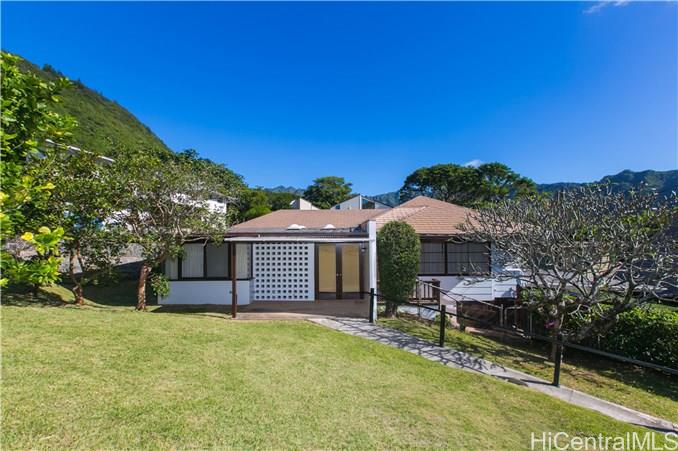 2216 Cooper Road Honolulu, HI 96822 - Photo 1 of 1 a view of a house with a backyard