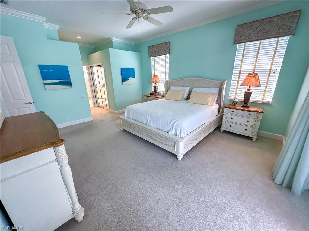 8229 Allendale Court Naples, FL 34120 - Photo 25 of 50 a bedroom with a bed and window