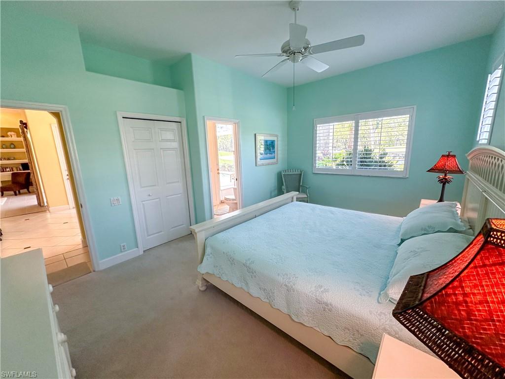 8229 Allendale Court Naples, FL 34120 - Photo 34 of 50 a bedroom with a bed and window