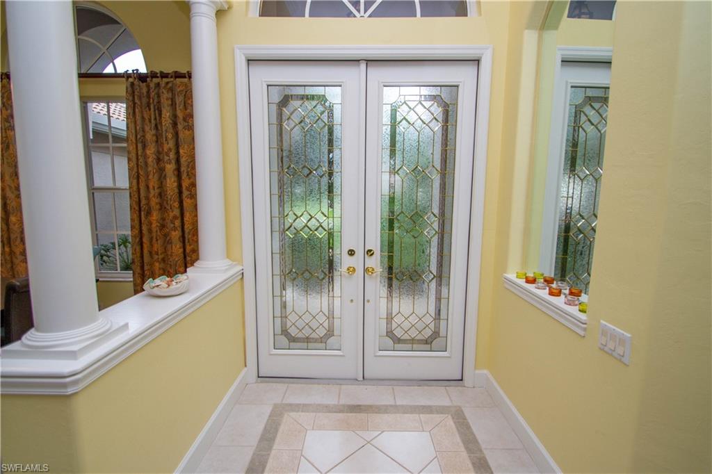 8229 Allendale Court Naples, FL 34120 - Photo 4 of 50 a view of an entryway door