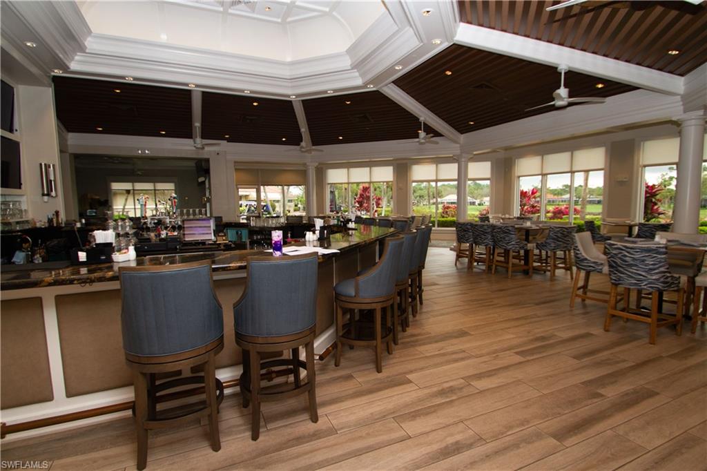 8229 Allendale Court Naples, FL 34120 - Photo 47 of 50 a view of a dining room with furniture window and outside view