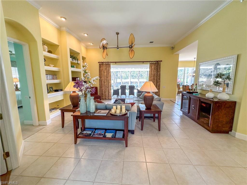 8229 Allendale Court Naples, FL 34120 - Photo 5 of 50 a view of a dining room with furniture window and outside view