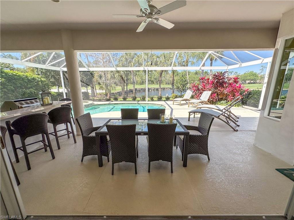 8229 Allendale Court Naples, FL 34120 - Photo 9 of 50 a view of a dining room with furniture window and outside view