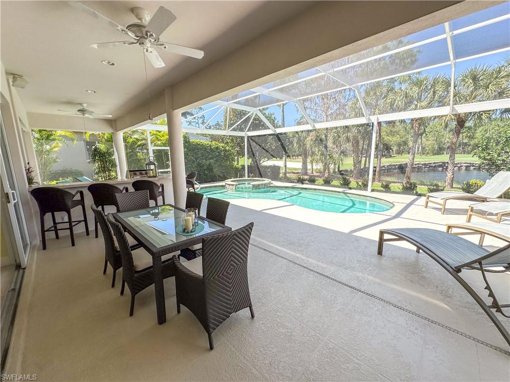 8229 Allendale Court Naples, FL 34120 - Photo 10 of 50 a view of a dining room with furniture window and outside view