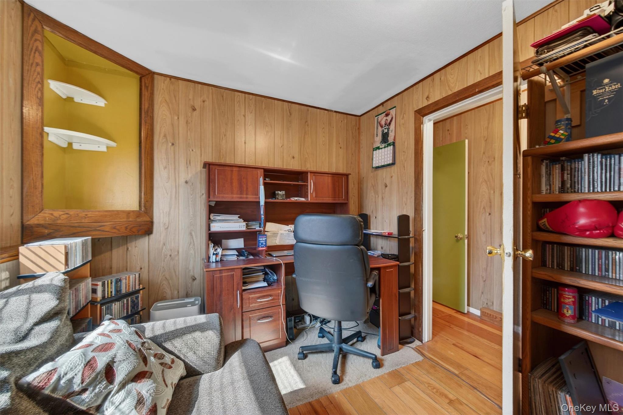 122 Rolling Meadows Road Middletown, NY 10940 - Photo 34 of 47 a workspace with furniture and book shelf