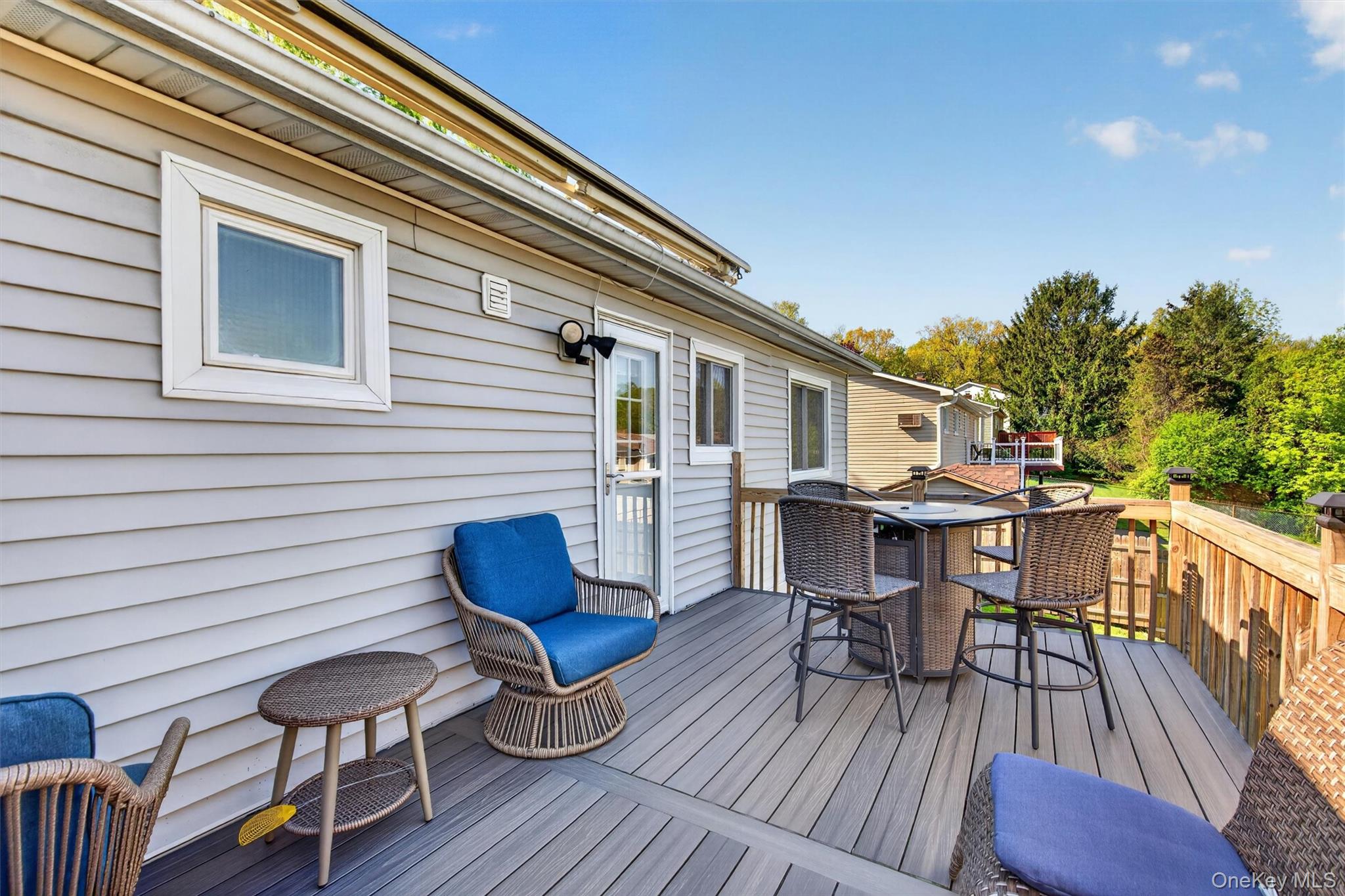 122 Rolling Meadows Road Middletown, NY 10940 - Photo 37 of 47 a view of a chairs and table on the deck