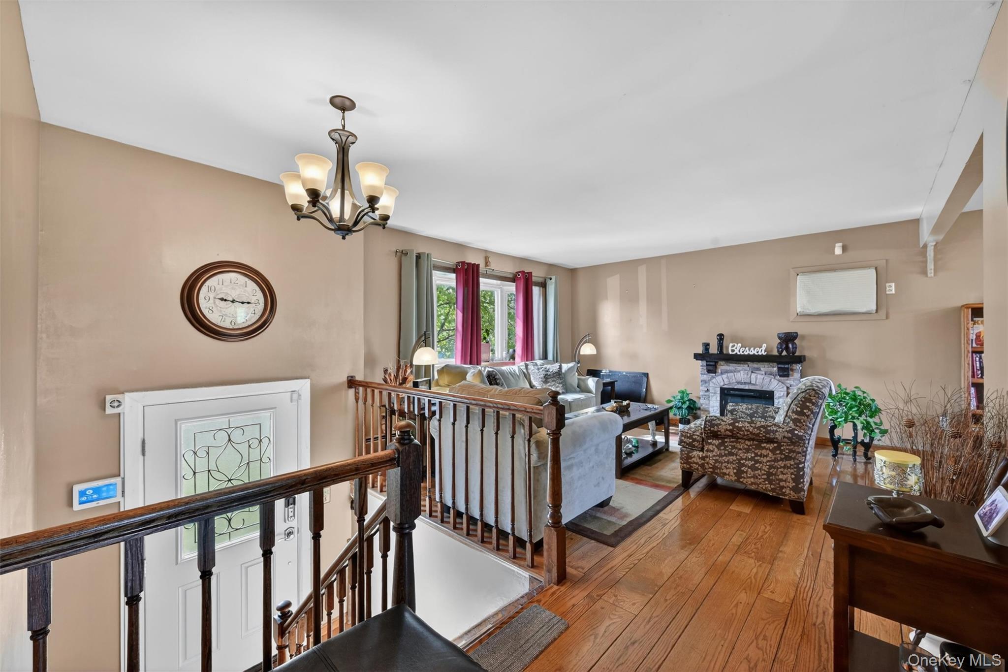 122 Rolling Meadows Road Middletown, NY 10940 - Photo 4 of 47 a view of a livingroom with furniture and hardwood floor