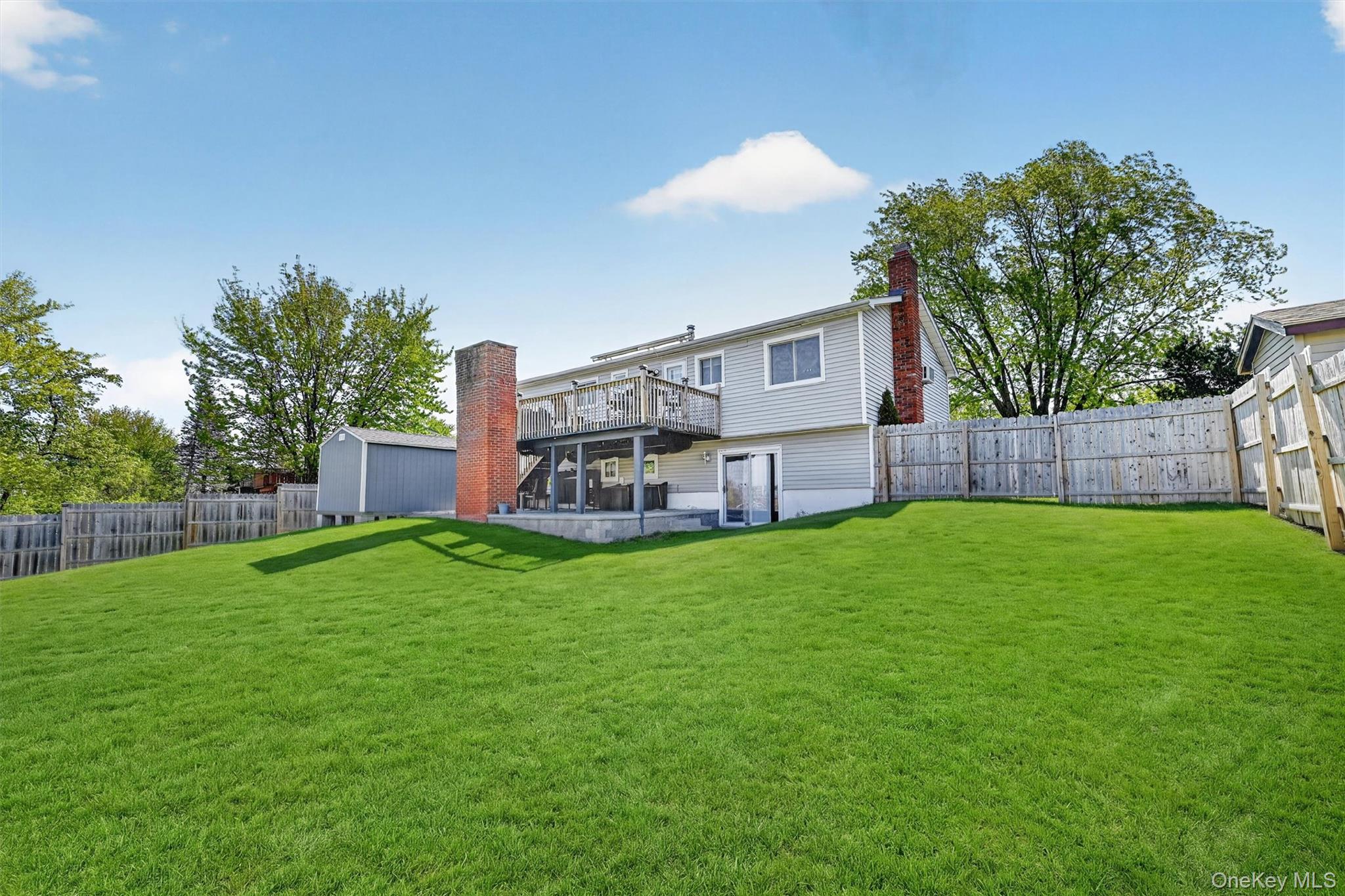 122 Rolling Meadows Road Middletown, NY 10940 - Photo 42 of 47 a view of a house with a backyard