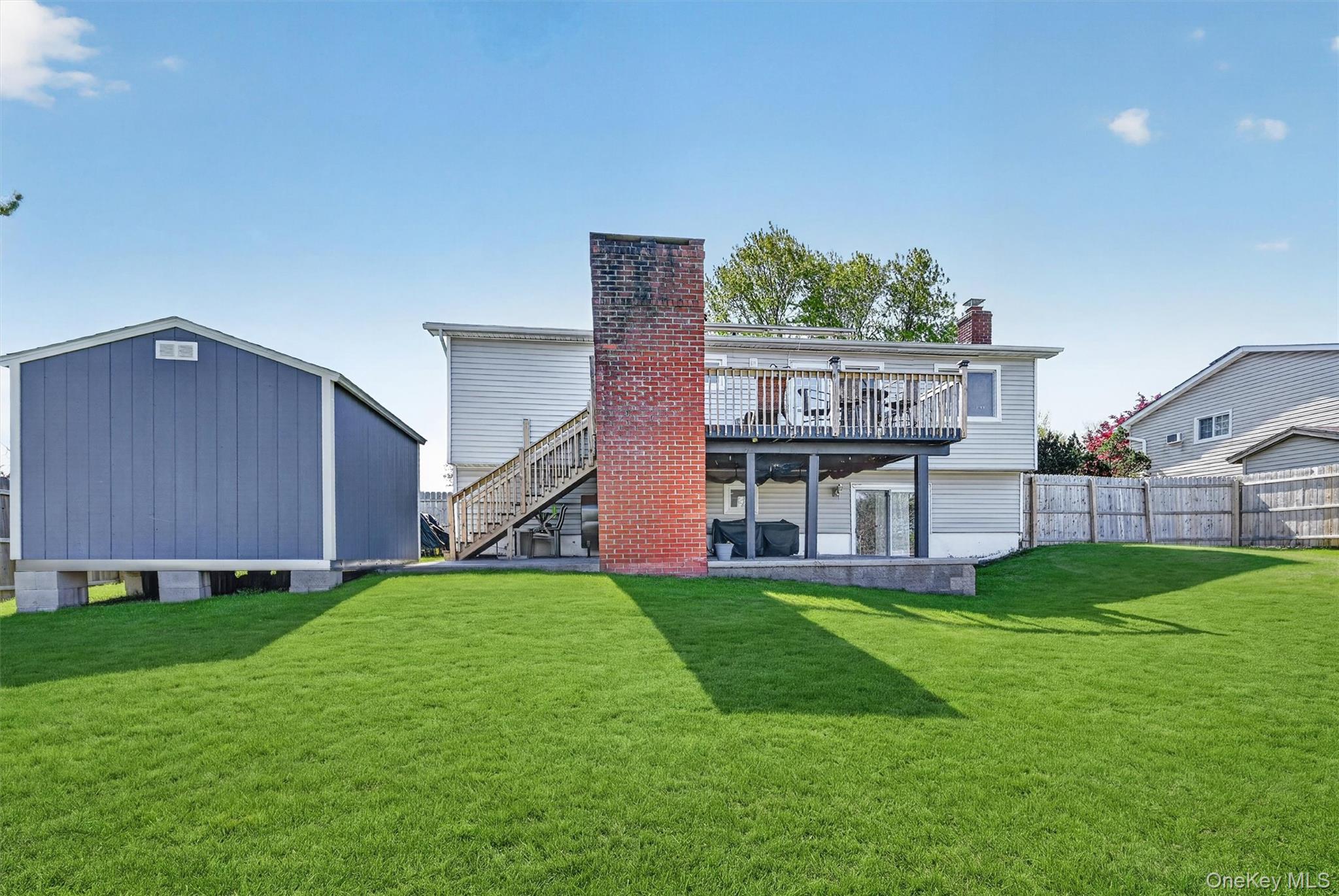 122 Rolling Meadows Road Middletown, NY 10940 - Photo 43 of 47 a view of a house with a yard and a porch
