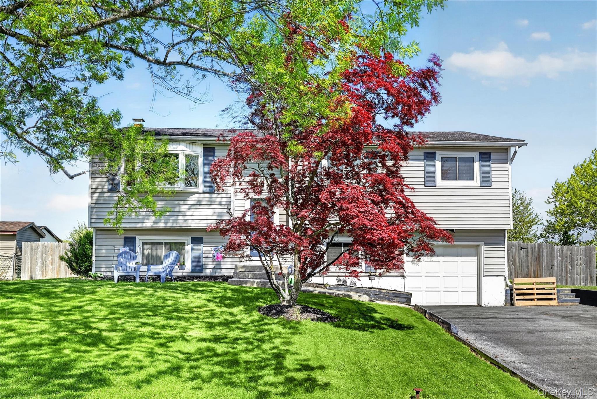 122 Rolling Meadows Road Middletown, NY 10940 - Photo 45 of 47 a view of house with a yard and a garden