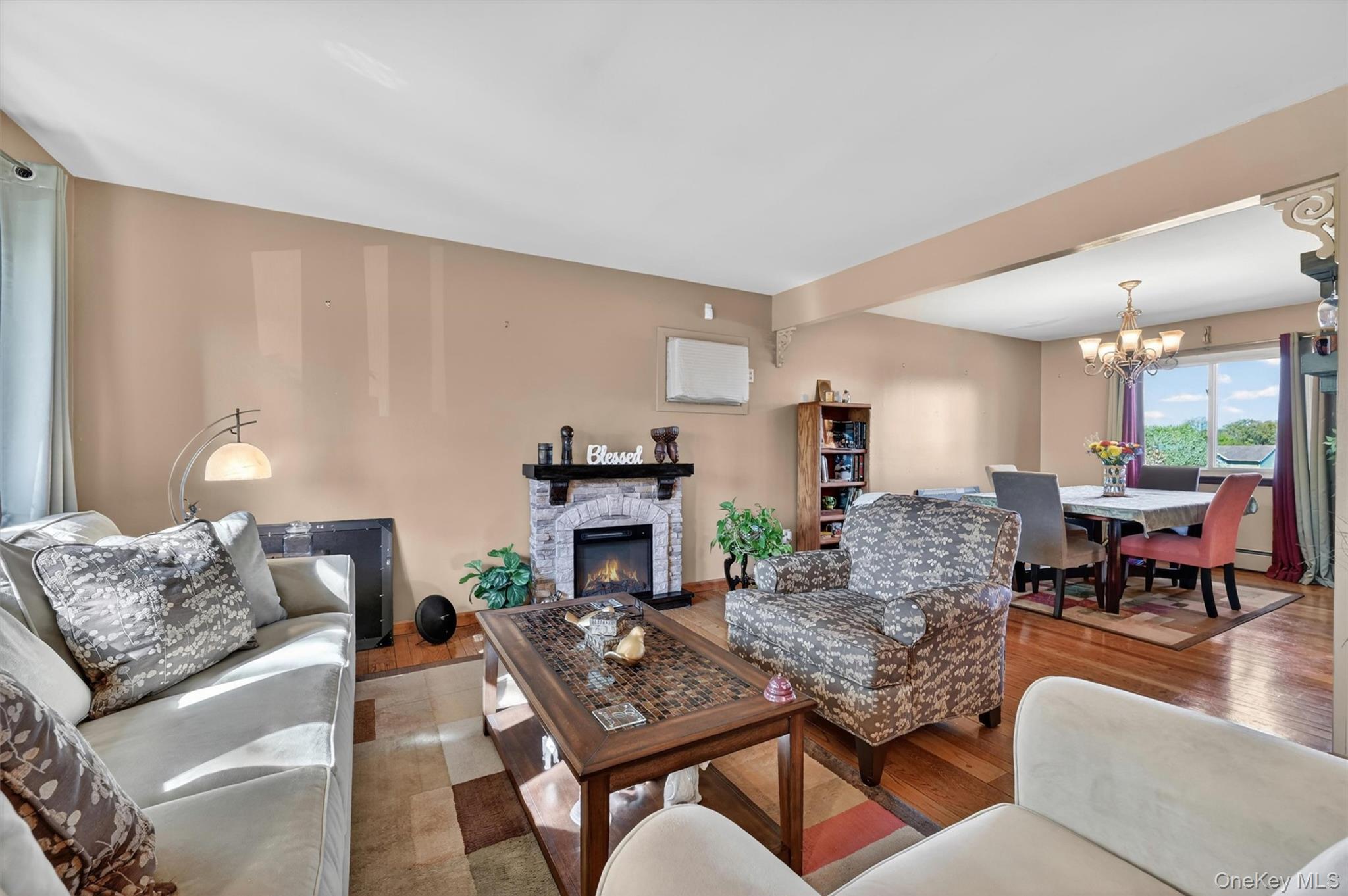122 Rolling Meadows Road Middletown, NY 10940 - Photo 7 of 47 a living room with furniture and a fireplace