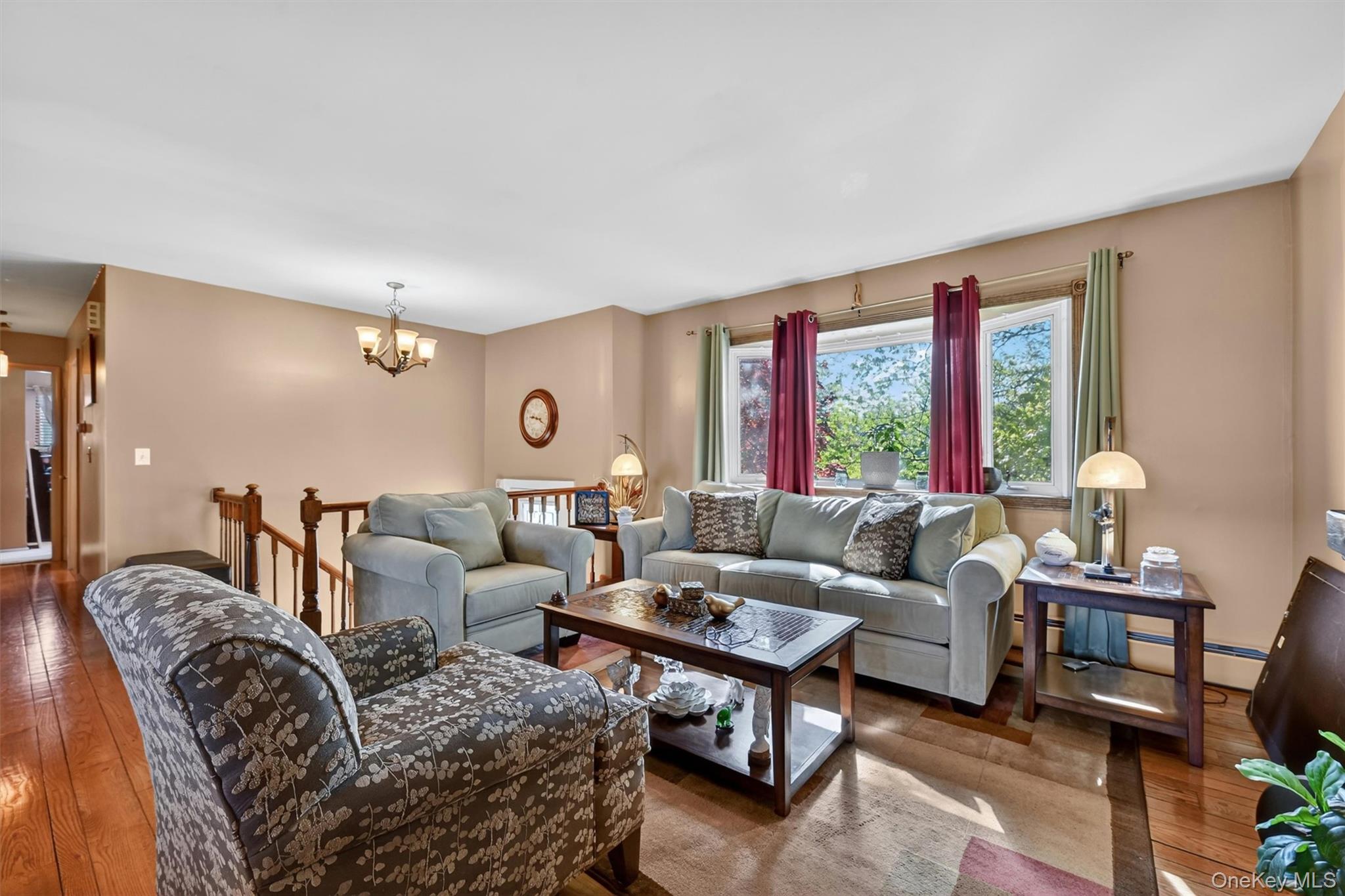 122 Rolling Meadows Road Middletown, NY 10940 - Photo 9 of 47 a living room with furniture and a large window