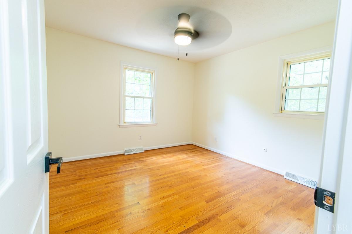 219 Izaak Walton Road Amherst, VA 24521 - Photo 20 of 32 a view of an empty room with a window
