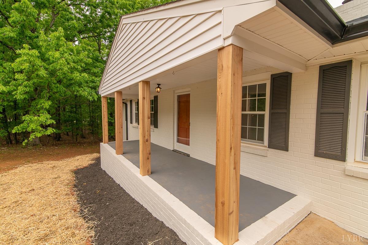 219 Izaak Walton Road Amherst, VA 24521 - Photo 3 of 32 a view of a house with backyard and porch