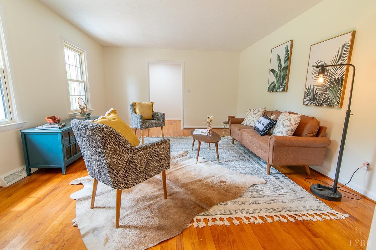 219 Izaak Walton Road Amherst, VA 24521 - Photo 6 of 32 a living room with furniture and a rug