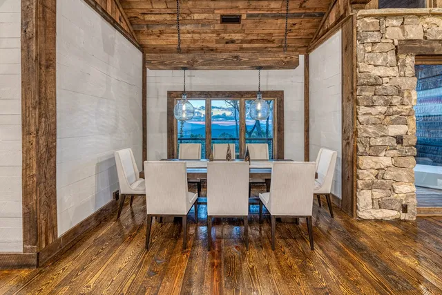 a view of sitting area with a table and chairs