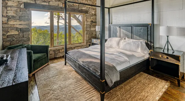 a bathroom with a shower and toilet