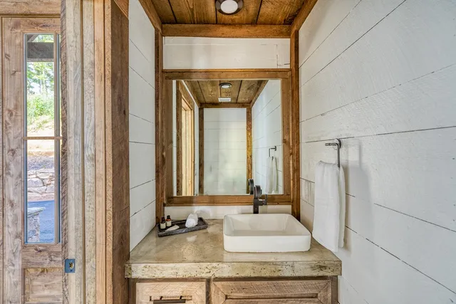 a living room with large windows