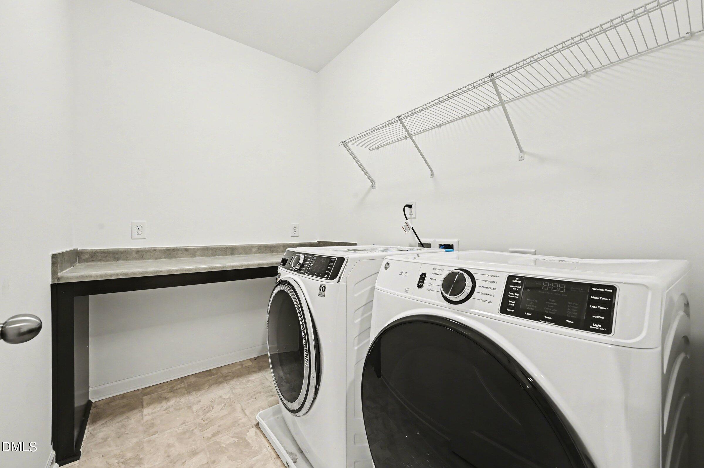 7015 Grainfield Road Mebane, NC 27302 - Photo 36 of 42 a utility room with dryer and washer
