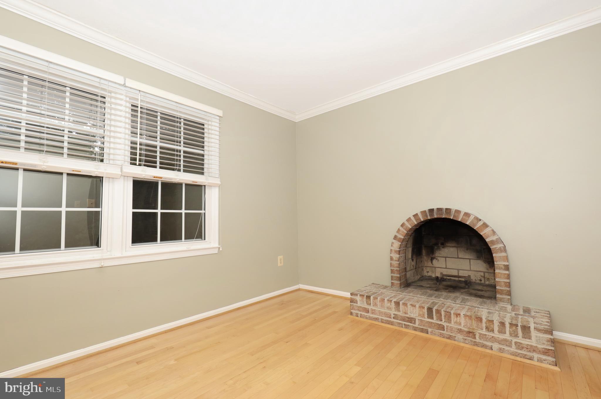 9925 Natick Road Burke, VA 22015 - Photo 25 of 66 Sitting room with fireplace