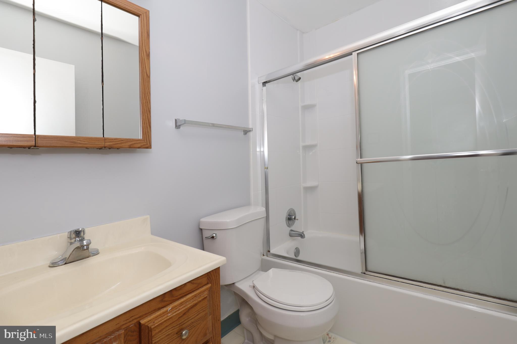 9925 Natick Road Burke, VA 22015 - Photo 37 of 66 master bath with tub + shower