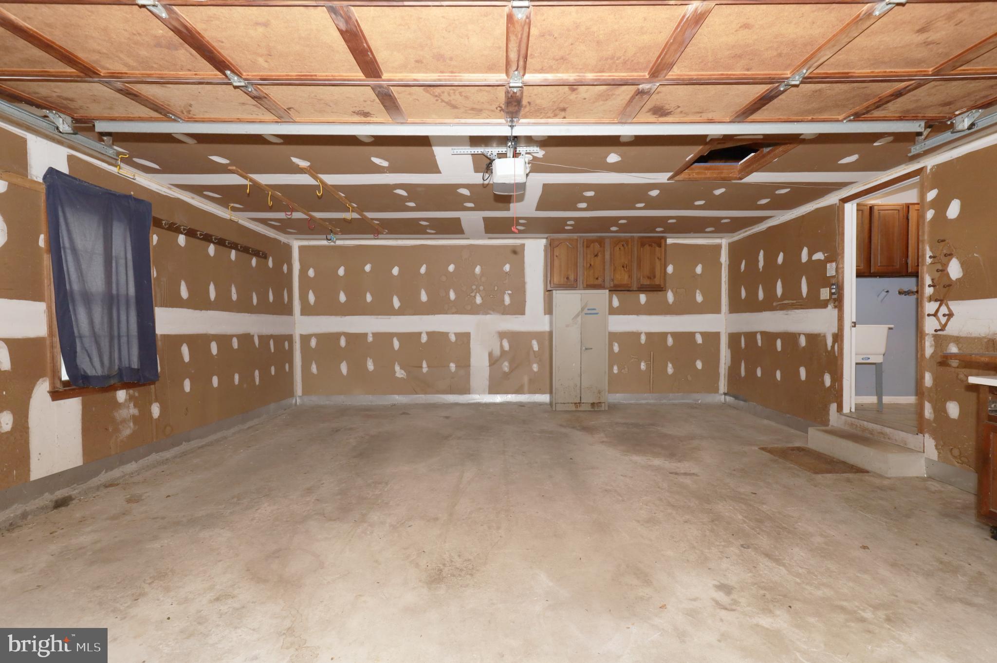 9925 Natick Road Burke, VA 22015 - Photo 45 of 66 2 car garage with workbench