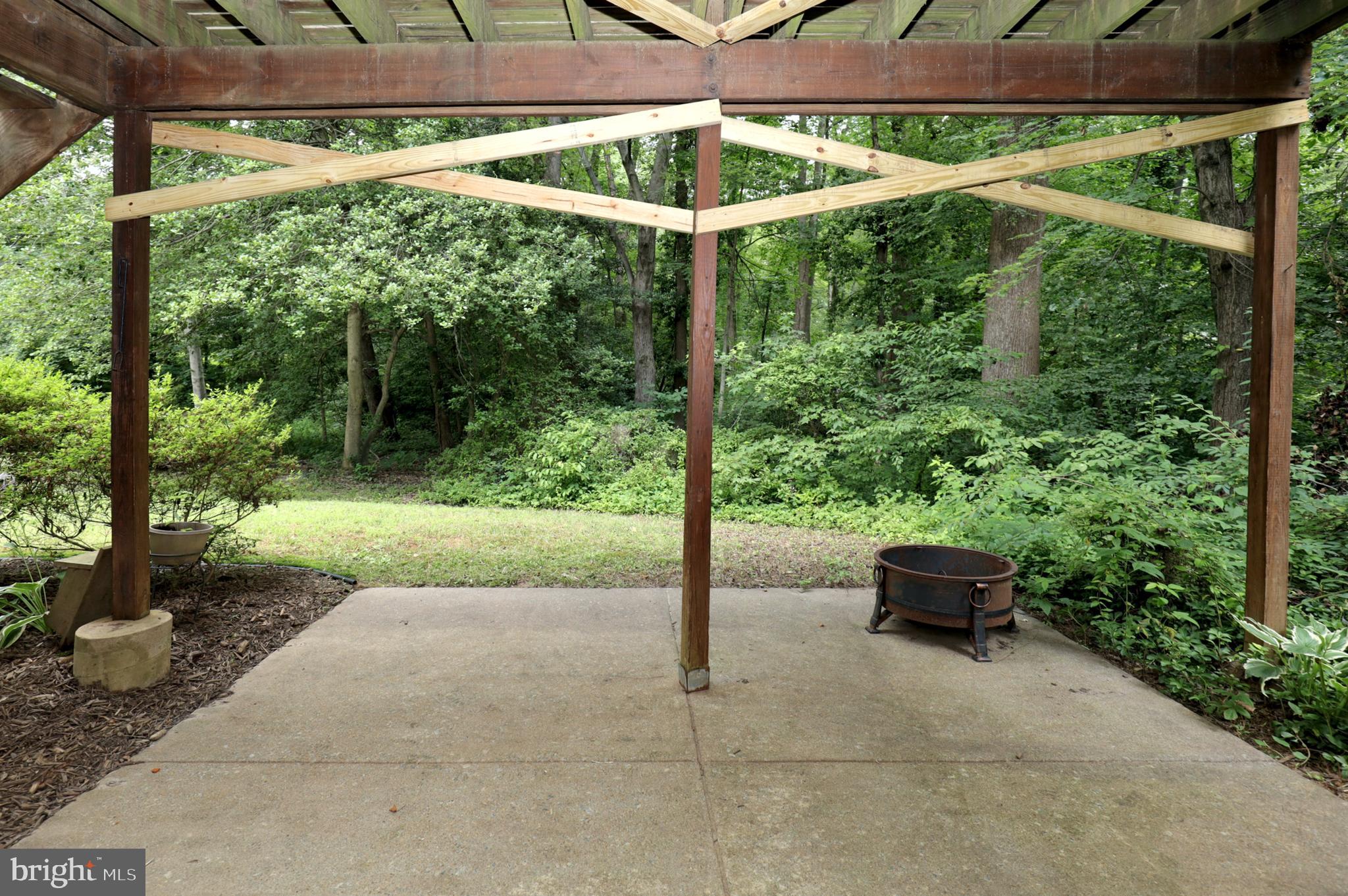 9925 Natick Road Burke, VA 22015 - Photo 48 of 66 concrete patio lower level