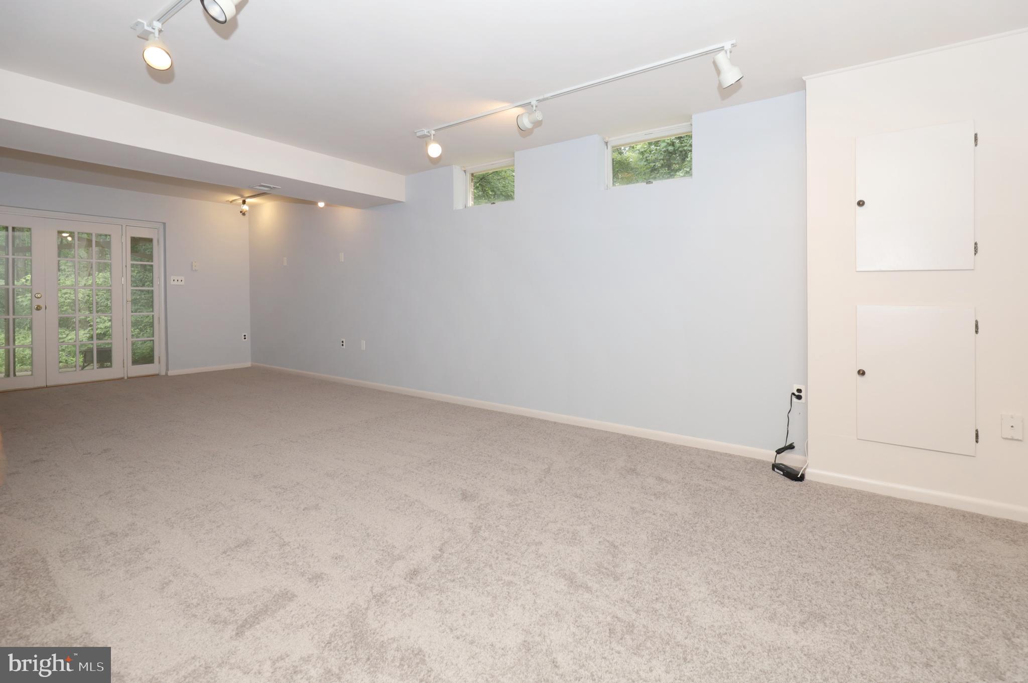 9925 Natick Road Burke, VA 22015 - Photo 50 of 66 Lower level rec room