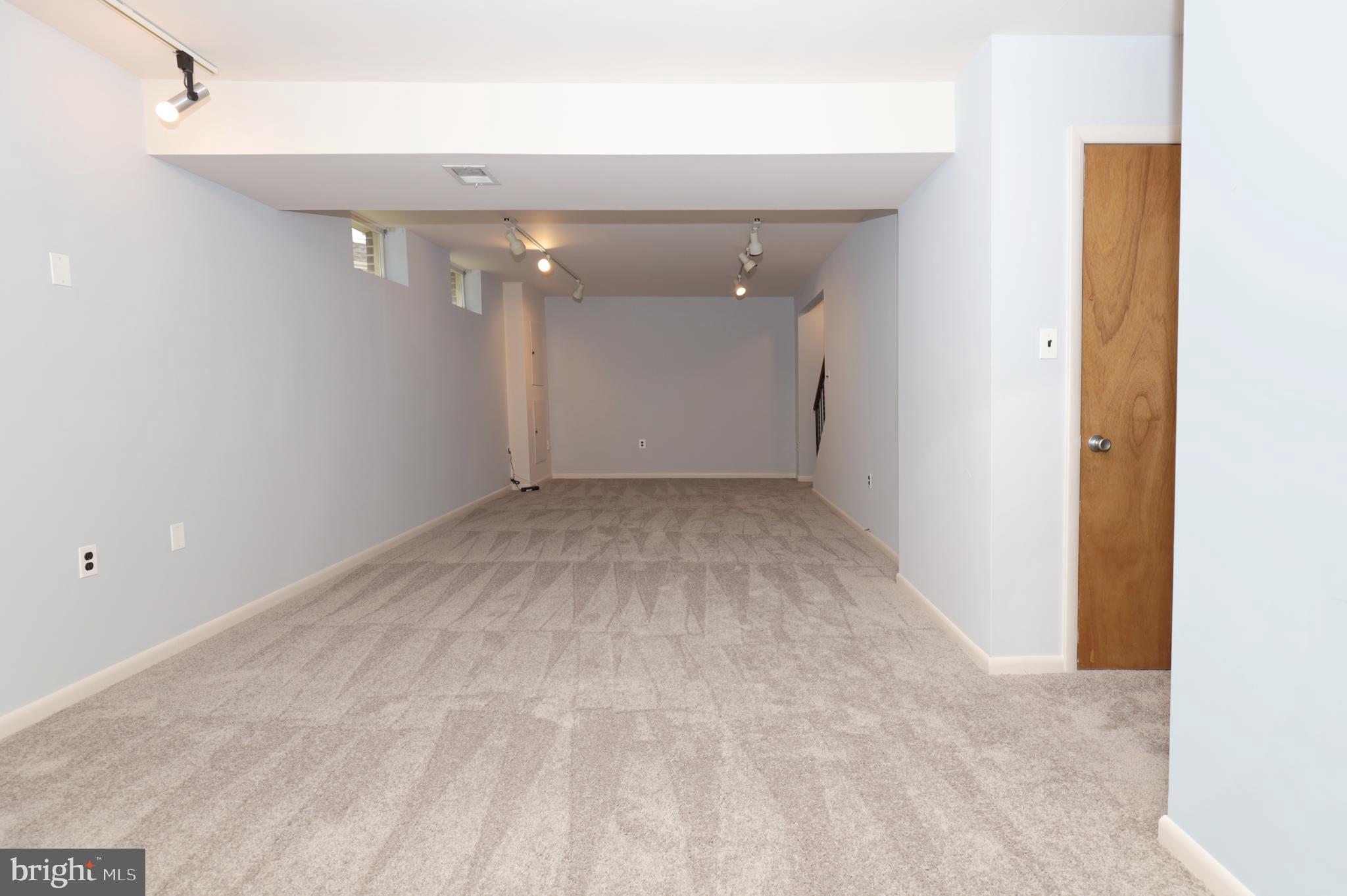 9925 Natick Road Burke, VA 22015 - Photo 51 of 66 Lower level rec room