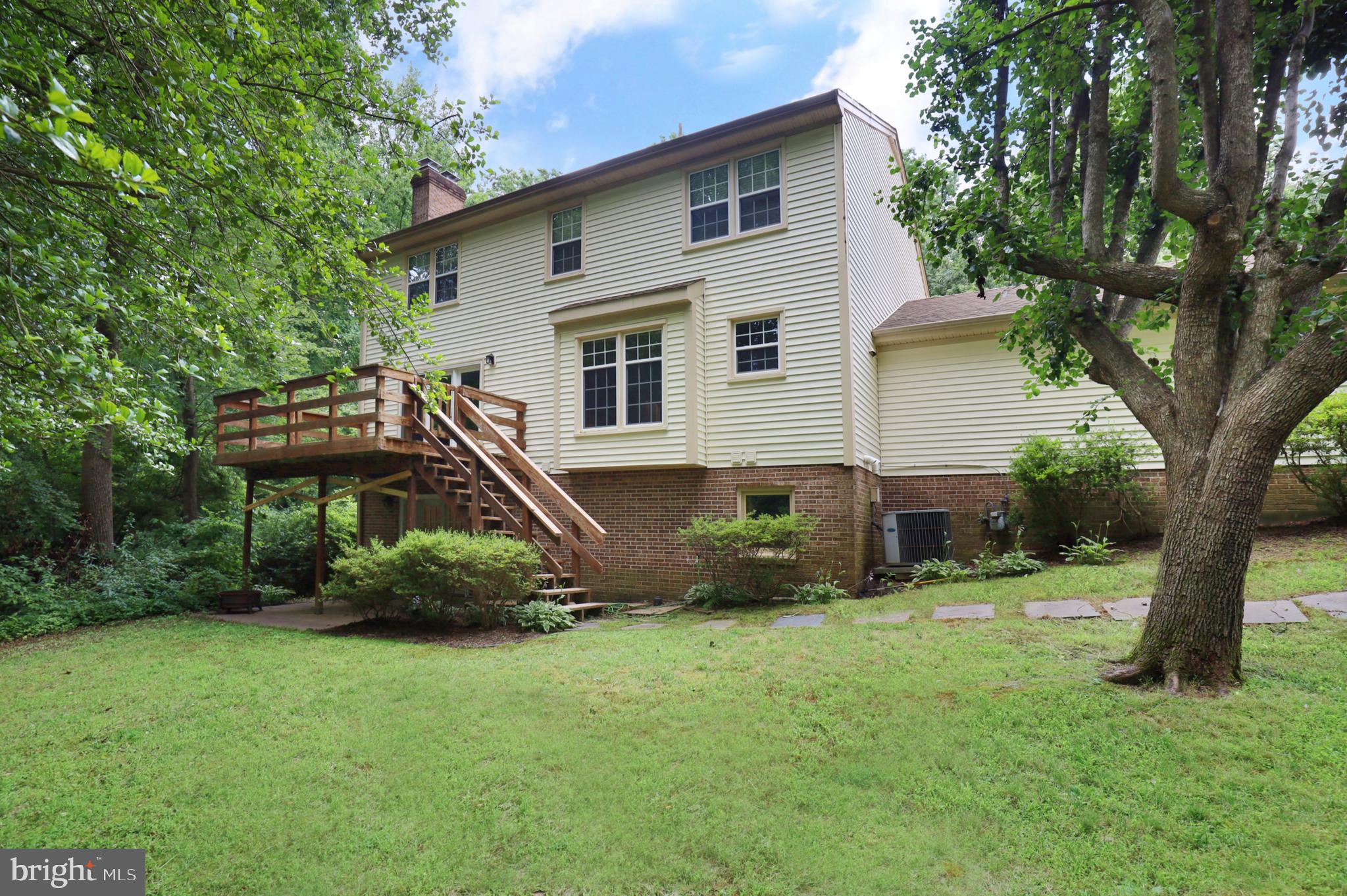 9925 Natick Road Burke, VA 22015 - Photo 53 of 66 Rear of house with deck and beautiful yard