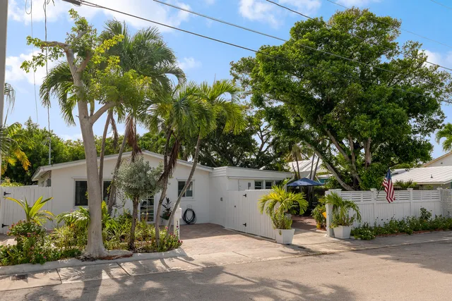 a view of a backyard of the house