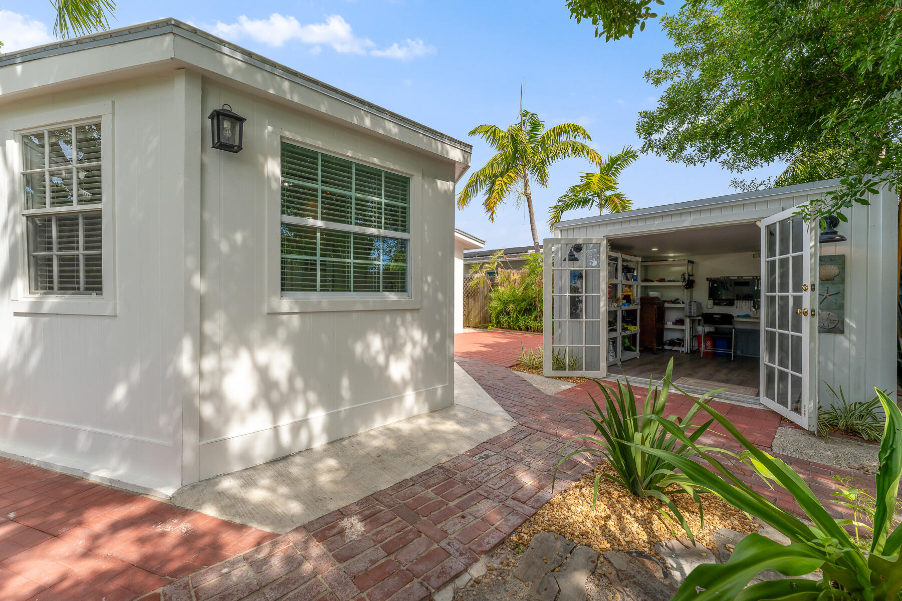 1513 5th Street Key West, FL 33040 - Photo 13 of 19 a front view of a house with a porch