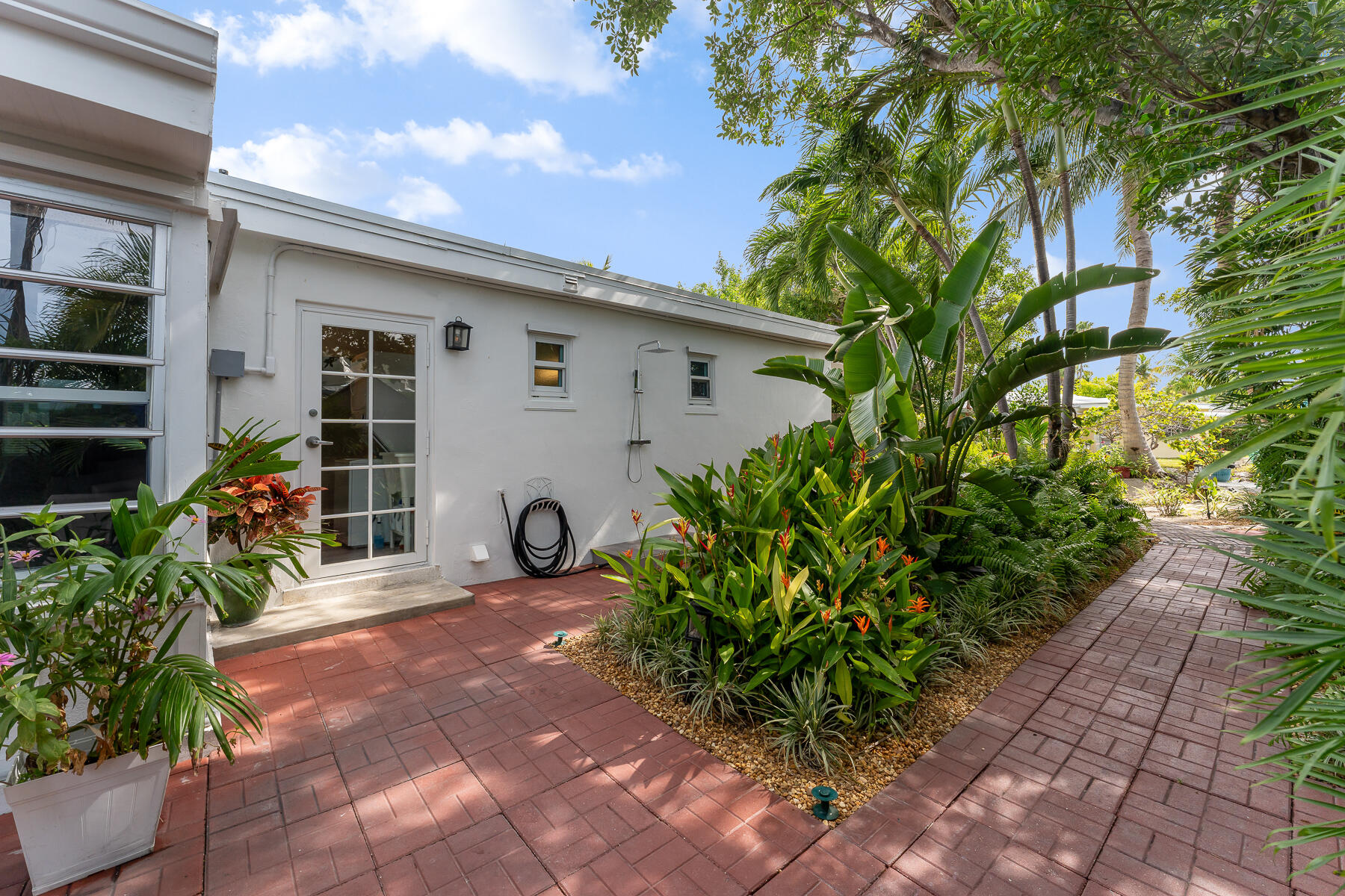 1513 5th Street Key West, FL 33040 - Photo 15 of 19 a front view of a house with garden