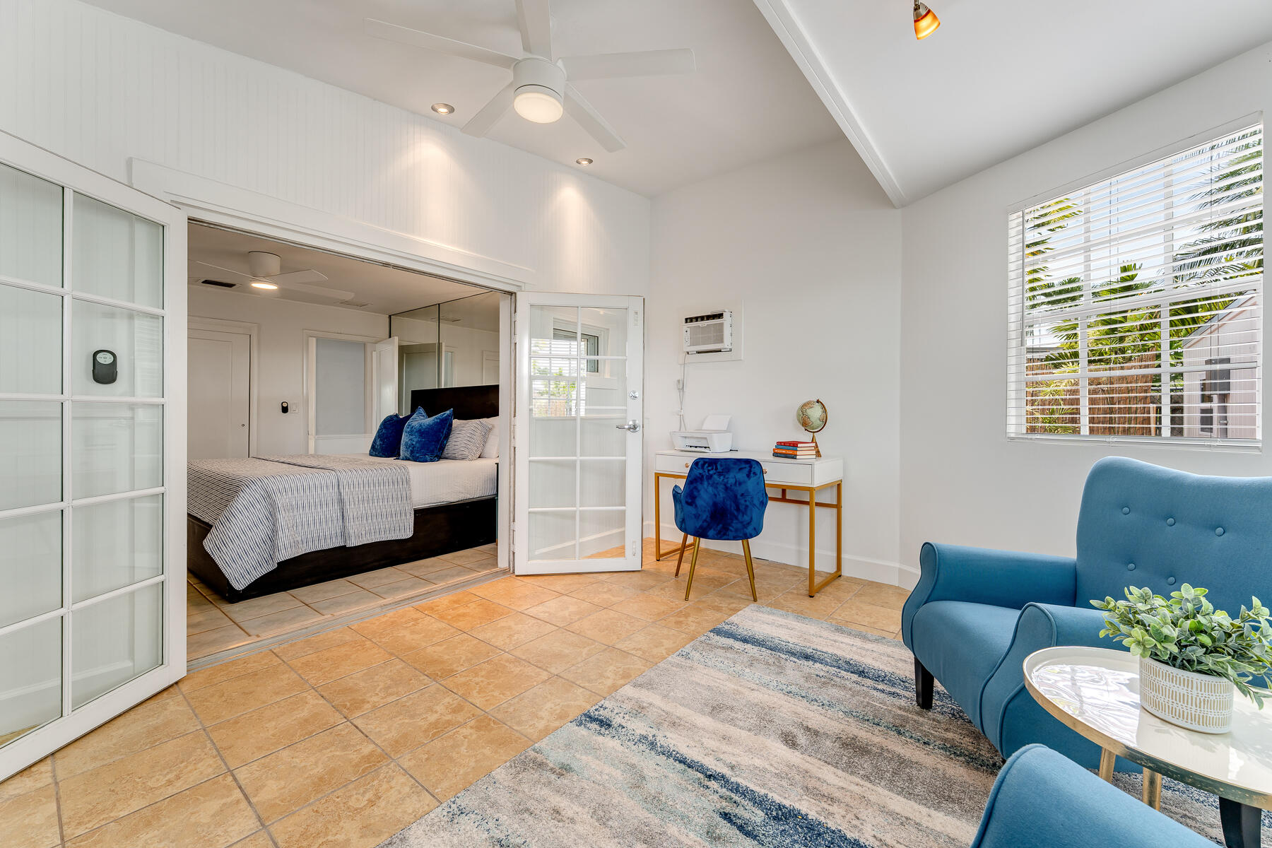 1513 5th Street Key West, FL 33040 - Photo 6 of 19 a bedroom with furniture and a large window