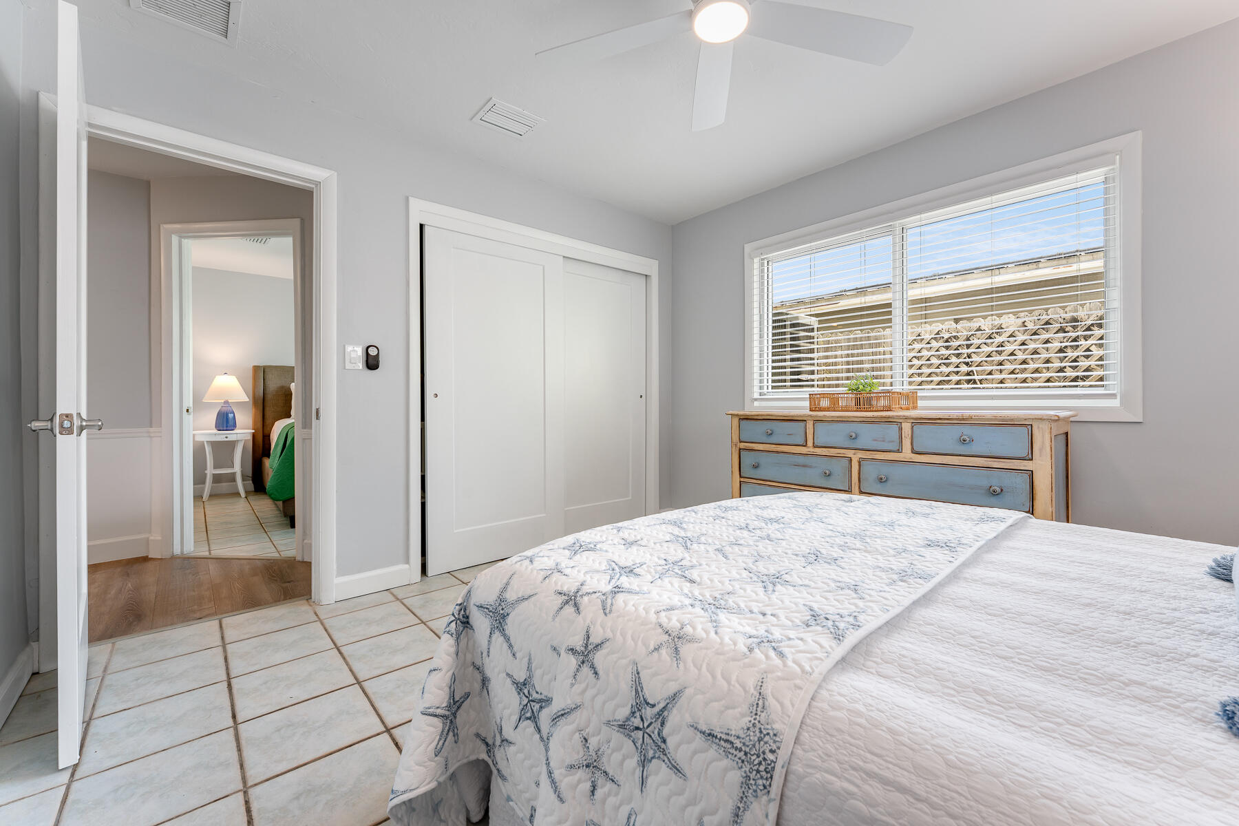 1513 5th Street Key West, FL 33040 - Photo 8 of 19 a bedroom with a bed and a window