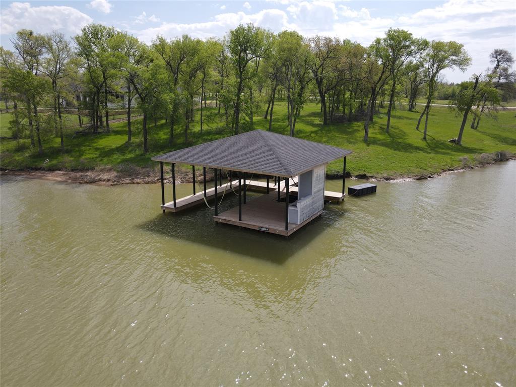 117 Diamond Point Drive Corsicana, TX 75109 - Photo 13 of 35 a view of a house with pool and a yard