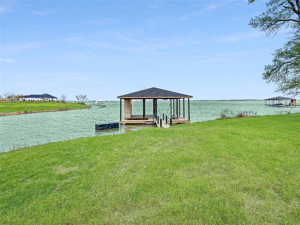 117 Diamond Point Drive Corsicana, TX 75109 - Photo 17 of 35 a view of a garden with an outdoor space