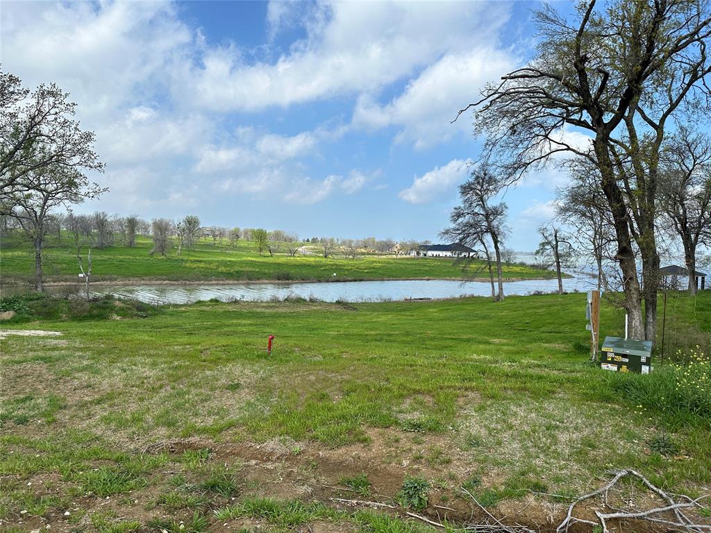 117 Diamond Point Drive Corsicana, TX 75109 - Photo 20 of 35 a view of outdoor space with deck and trees