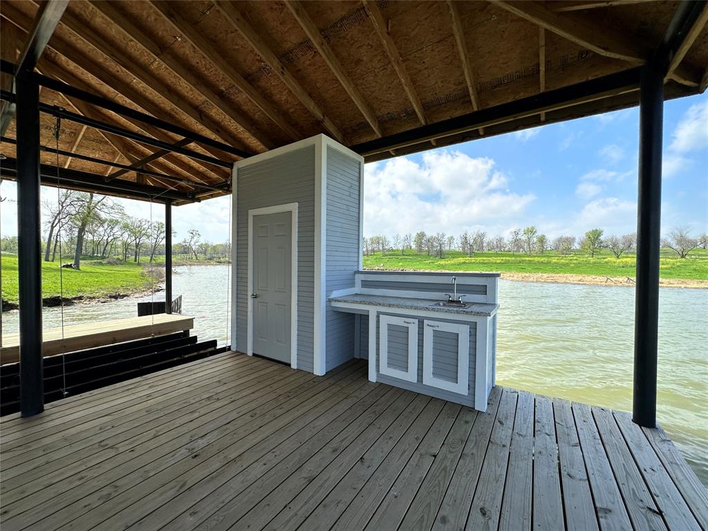 117 Diamond Point Drive Corsicana, TX 75109 - Photo 10 of 35 a view of a two room with wooden floor and outdoor space