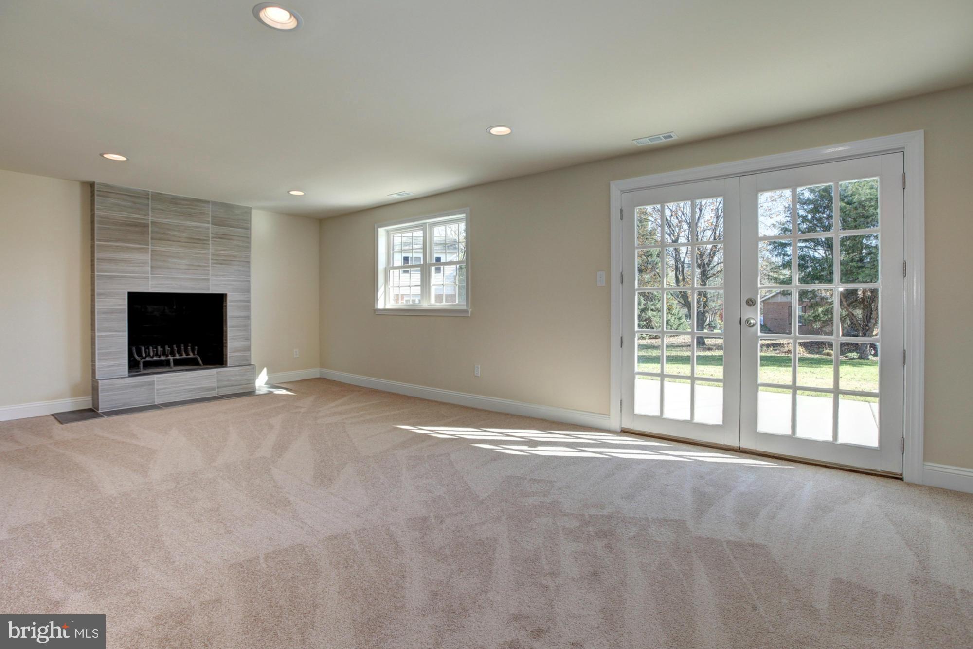249 Coldbrook Road Lutherville-Timonium, MD 21093 - Photo 15 of 30 Family Room with sliders to level yard