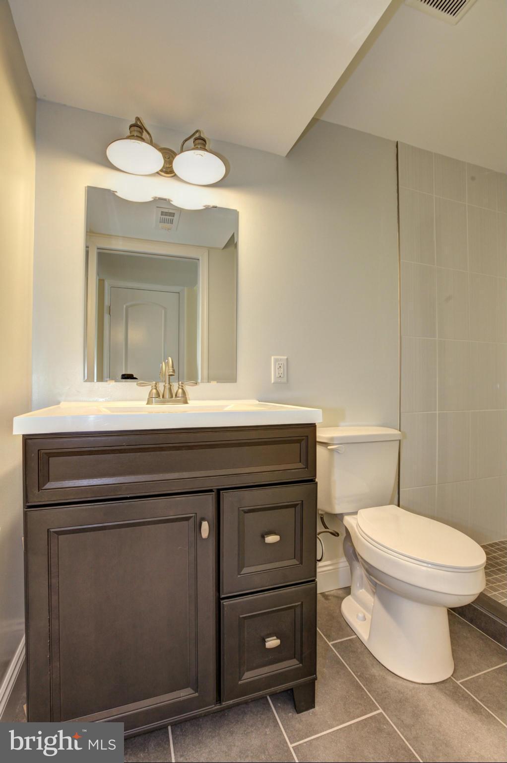 249 Coldbrook Road Lutherville-Timonium, MD 21093 - Photo 17 of 30 Full bath off family room