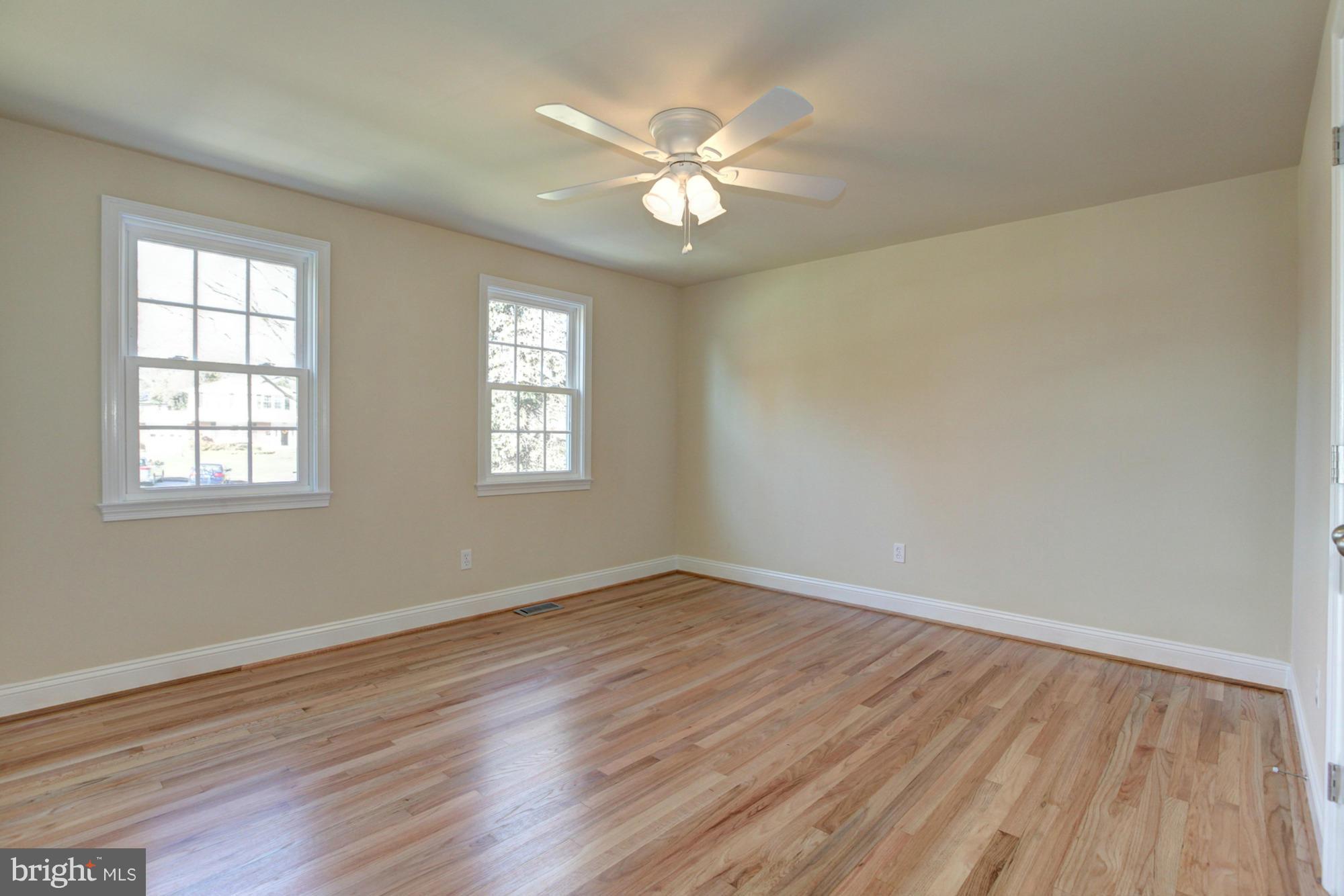 249 Coldbrook Road Lutherville-Timonium, MD 21093 - Photo 27 of 30 Bedroom 2 with ceiling fan, double-doored closet