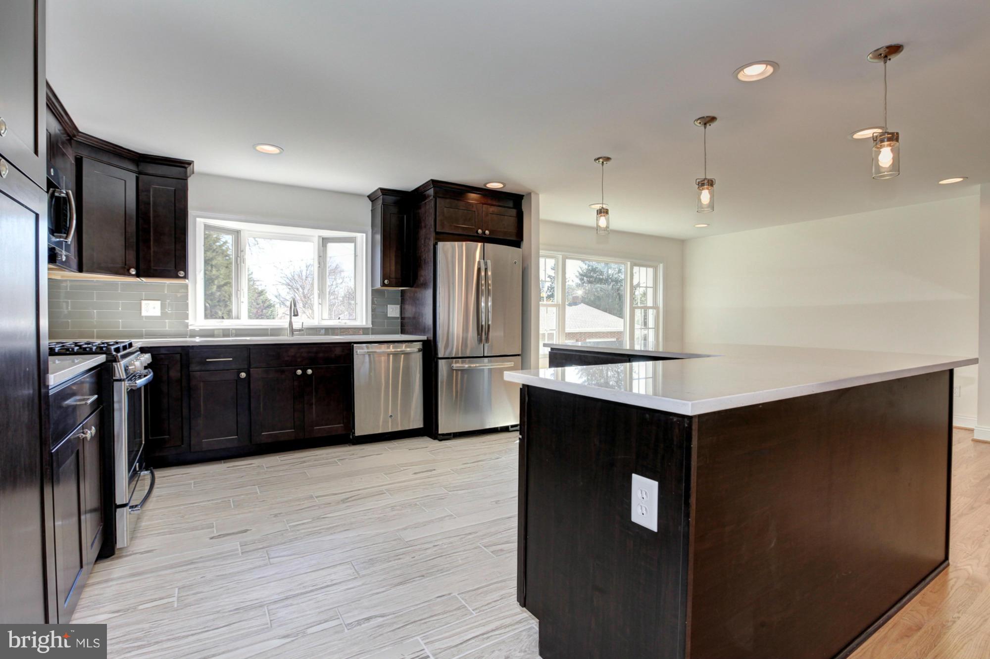 249 Coldbrook Road Lutherville-Timonium, MD 21093 - Photo 9 of 30 Ceramic flooring, quartz counters, ss appliances
