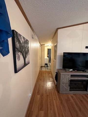 8800 South Harlem Avenue, Unit 809 Bridgeview, IL 60455 - Photo 7 of 14 a view of a livingroom with wooden floor and a flat screen tv