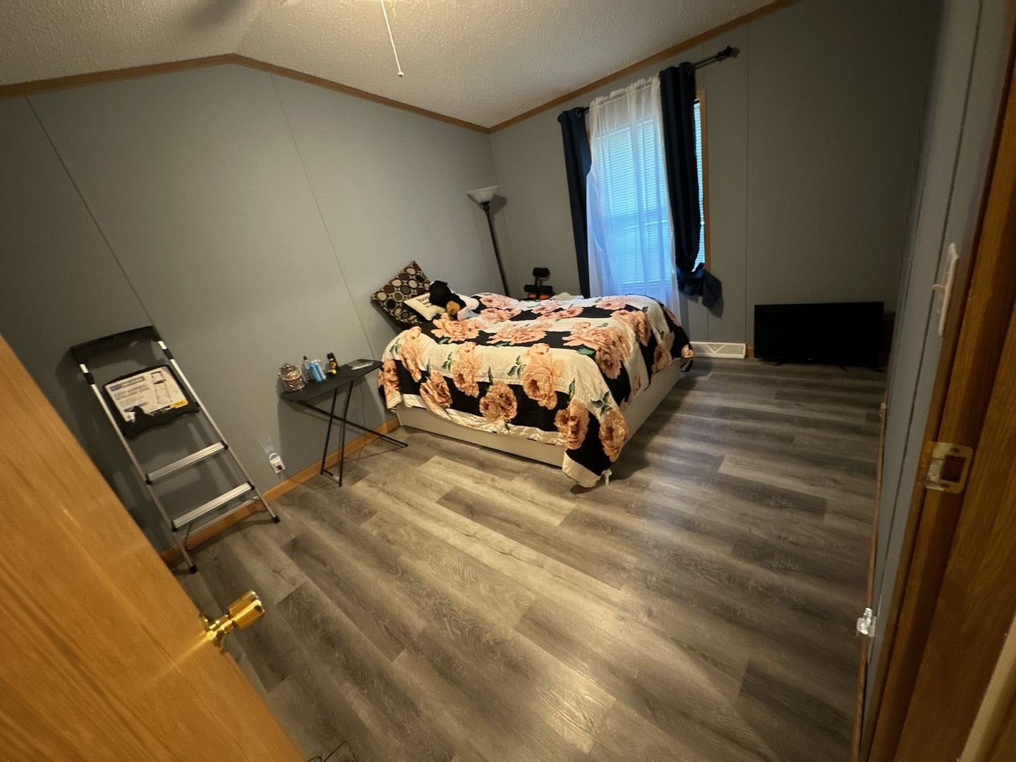 8800 South Harlem Avenue, Unit 809 Bridgeview, IL 60455 - Photo 8 of 14 a bedroom with a bed and wooden floor