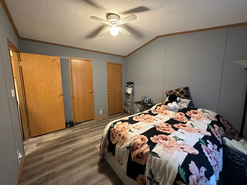 8800 South Harlem Avenue, Unit 809 Bridgeview, IL 60455 - Photo 9 of 14 a bed sitting in a bedroom next to a window