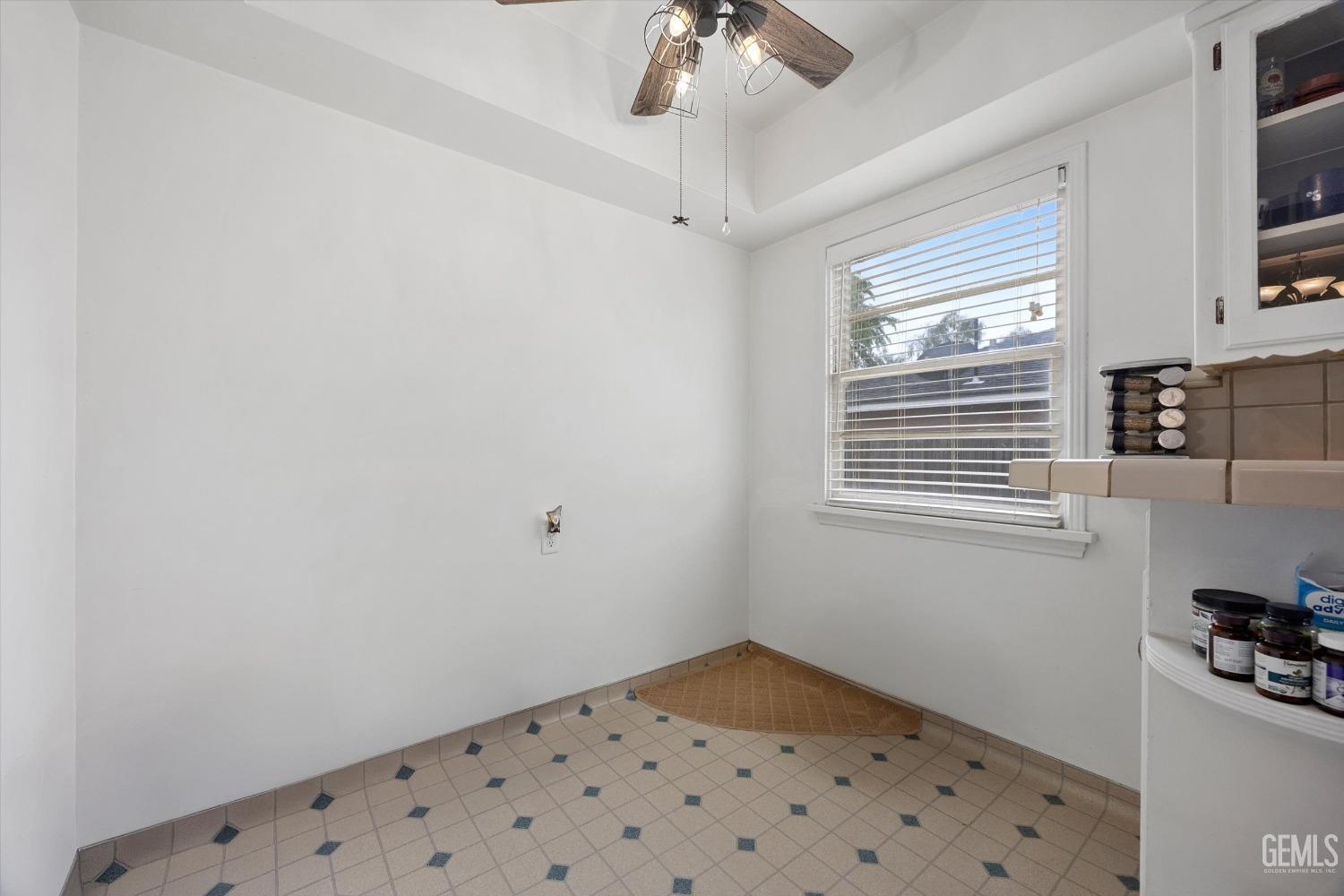 Undisclosed Address Bakersfield, CA 93305 - Photo 23 of 46 a view of an empty room with a window