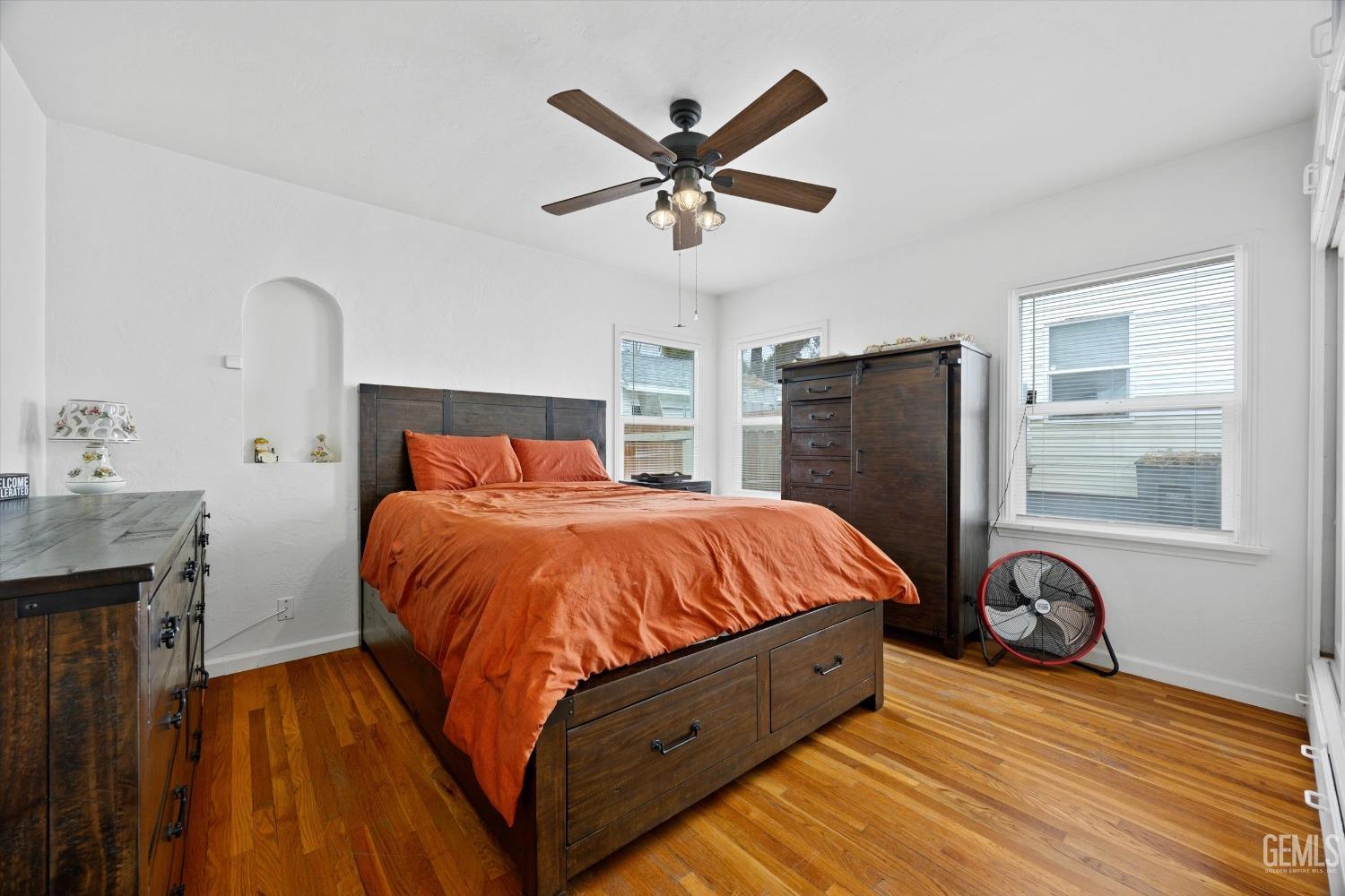 Undisclosed Address Bakersfield, CA 93305 - Photo 27 of 46 a bed sitting in a bedroom with a bed and window
